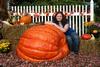 Daughter Autumn and the 860 at the fence in the front yard.